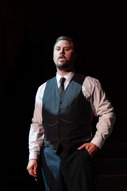 Sam Young as Nick Shadow creating a visible vapour effect with a Stage Props theatrical cigarette in The Rake’s Progress.